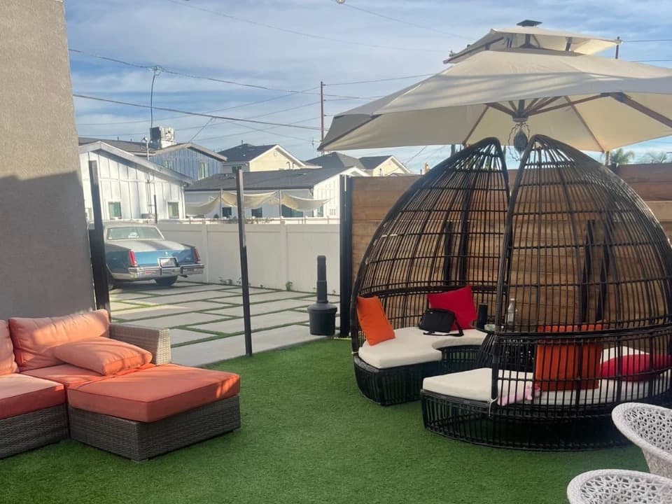 Covered patio with lounge seating and shade